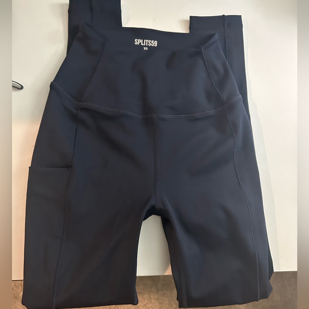 Brand new worn once to try on 7/8 length